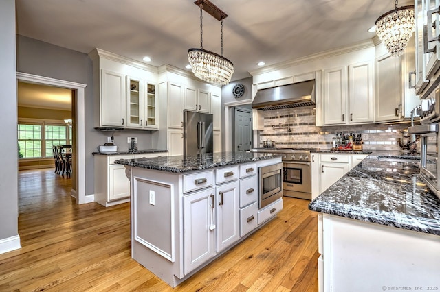 2 Butternut Ridge Rd, Oxford, CT 06478 - kitchen featuring high end appliances, wall chimney exhaust hood, a chandelier, a kitchen island, and recessed lighting