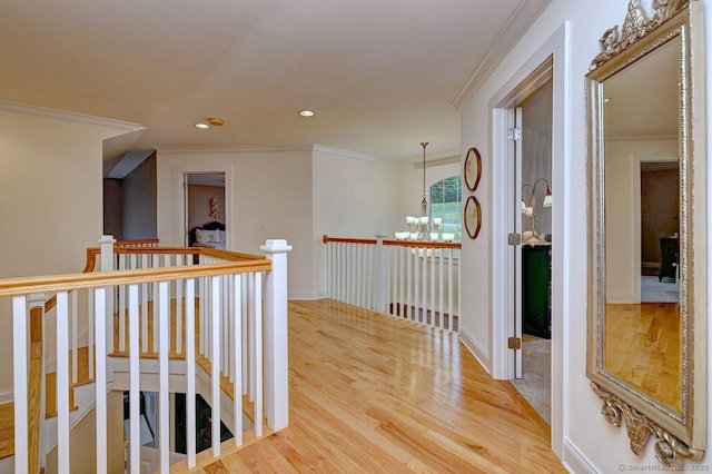 2 Butternut Ridge Rd, Oxford, CT 06478 - hall featuring a chandelier, an upstairs landing, wood finished floors, crown molding, and baseboards