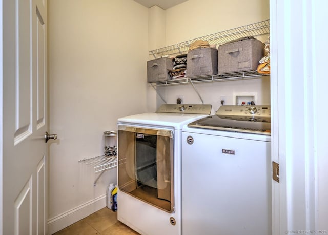 2 Butternut Ridge Rd, Oxford, CT 06478 - laundry area featuring washing machine and clothes dryer, light tile patterned floors, and baseboards