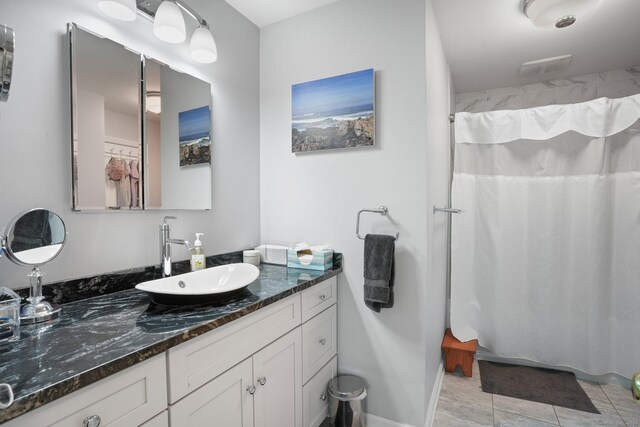 25 Fleetwood Dr, New Fairfield, CT 06812 - bathroom featuring vanity, curtained shower, and tile patterned flooring