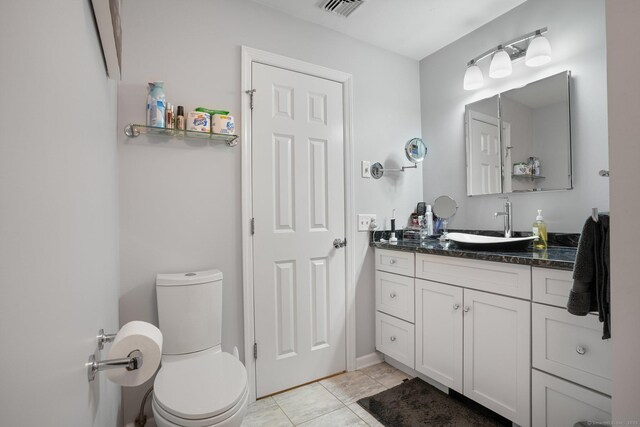25 Fleetwood Dr, New Fairfield, CT 06812 - bathroom featuring toilet, vanity, and tile patterned floors