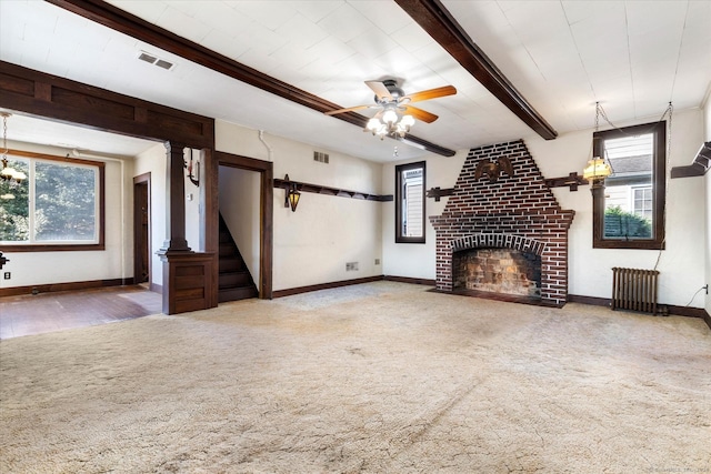 16 Hill Rd, East Lyme, CT 06333 - unfurnished living room with a fireplace, carpet floors, beam ceiling, baseboards, and stairs