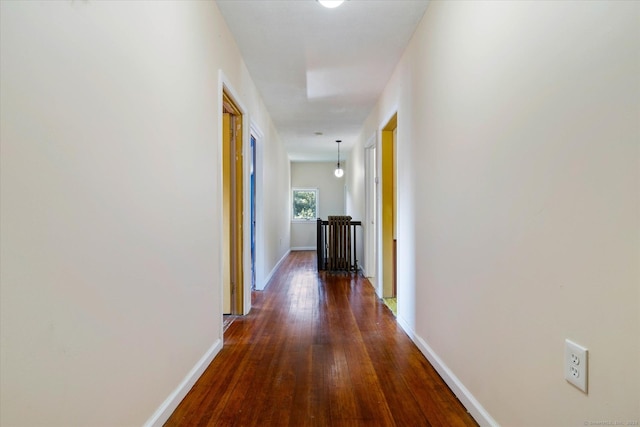 16 Hill Rd, East Lyme, CT 06333 - hallway featuring baseboards and dark wood-type flooring