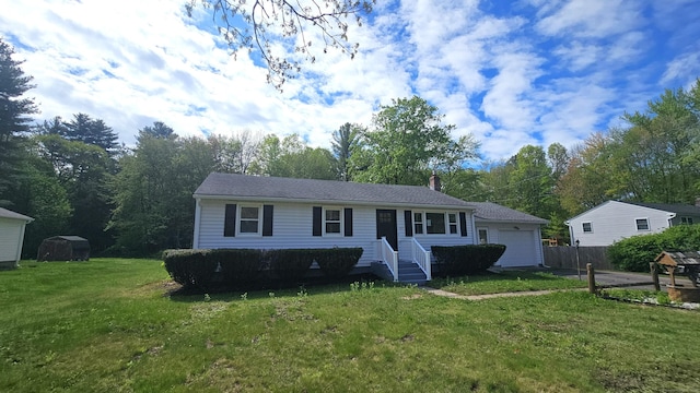137 Wells Rd, East Windsor, CT 06088 - ranch-style house with a front lawn, a detached garage, and a chimney