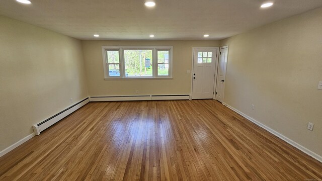 137 Wells Rd, East Windsor, CT 06088 - foyer with a baseboard radiator, baseboard heating, wood finished floors, recessed lighting, and baseboards