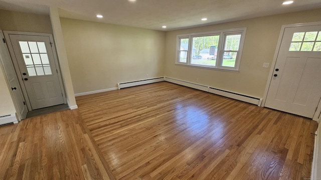 137 Wells Rd, East Windsor, CT 06088 - entrance foyer with light wood-type flooring, a baseboard radiator, recessed lighting, a baseboard heating unit, and baseboards
