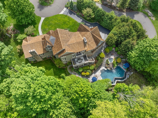view from above of property featuring a pool area