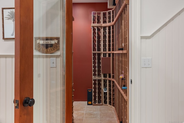 wine area featuring a decorative wall
