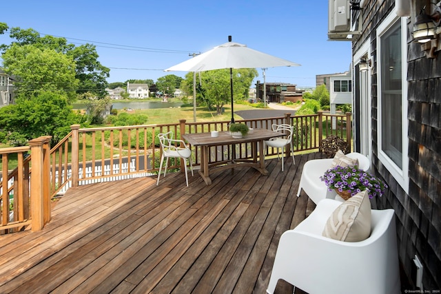 5 Park Ln, Norwalk, CT 06854 - wooden terrace with outdoor dining area and a water view