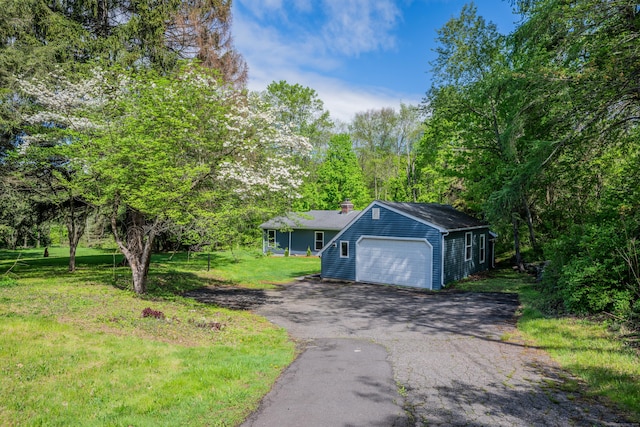 779 New Britain Ave, Rocky Hill, CT 06067 - garage featuring asphalt driveway