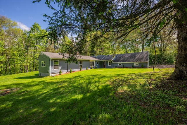 779 New Britain Ave, Rocky Hill, CT 06067 - back of property featuring a lawn