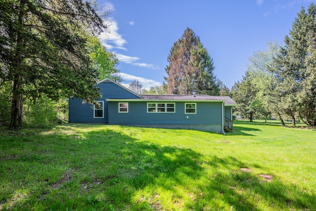 779 New Britain Ave, Rocky Hill, CT 06067 - back of house with a lawn