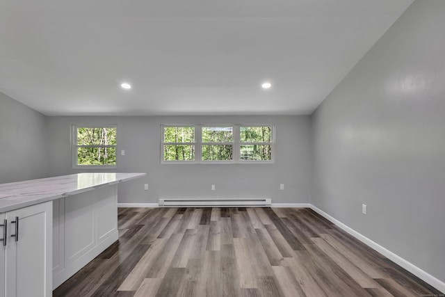 779 New Britain Ave, Rocky Hill, CT 06067 - empty room with a baseboard heating unit, healthy amount of natural light, dark wood finished floors, recessed lighting, and baseboards
