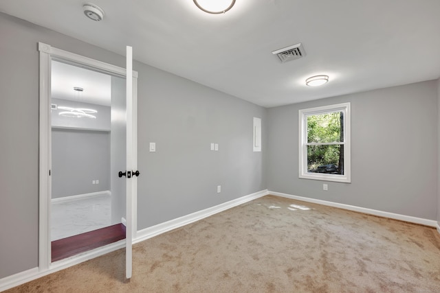 779 New Britain Ave, Rocky Hill, CT 06067 - empty room featuring baseboards, carpet, a smoke detector, and a chandelier