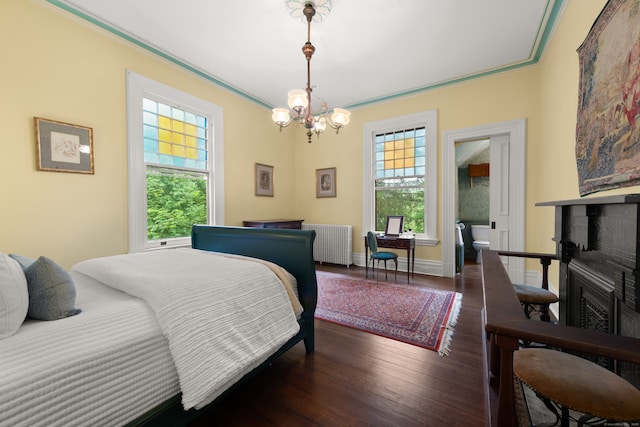 13 Sugar St, Newtown, CT 06470 - bedroom featuring radiator heating unit, multiple windows, wood finished floors, crown molding, and a chandelier