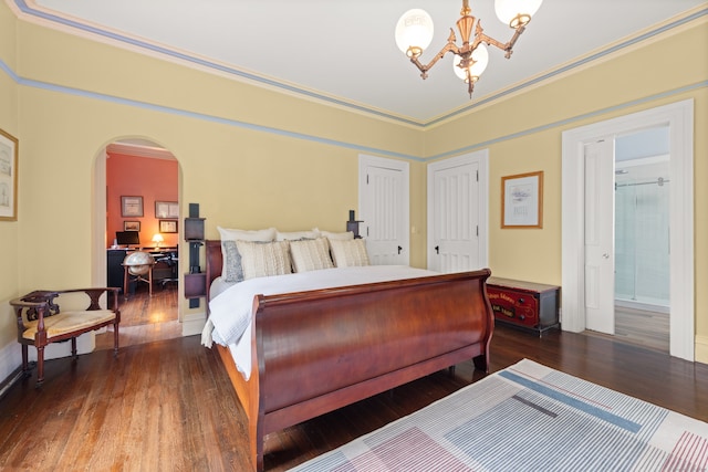 13 Sugar St, Newtown, CT 06470 - bedroom featuring hardwood / wood-style floors, a chandelier, and arched walkways