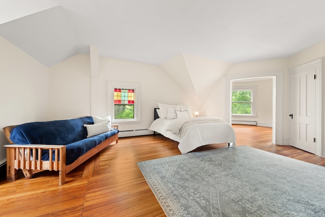 13 Sugar St, Newtown, CT 06470 - bedroom featuring a baseboard radiator, baseboard heating, vaulted ceiling, and light wood finished floors