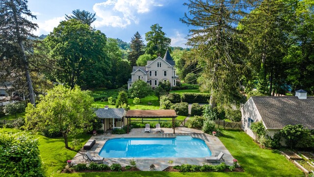 13 Sugar St, Newtown, CT 06470 - view of pool featuring a storage structure, a patio area, and an outbuilding