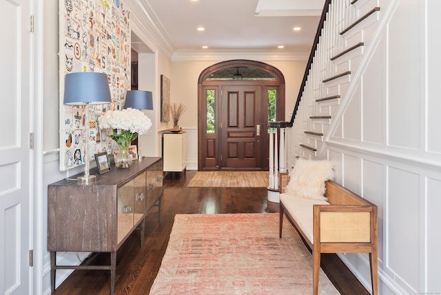 68 Woods End Rd, New Canaan, CT 06840 - entryway featuring dark wood-type flooring, ornamental molding, stairway, and recessed lighting