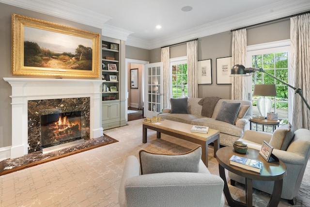 68 Woods End Rd, New Canaan, CT 06840 - living area with a premium fireplace, plenty of natural light, ornamental molding, recessed lighting, and built in shelves
