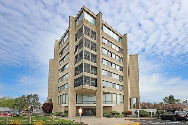 140 Captain Thomas Blvd Unit 307, West Haven, CT 06516 - view of property featuring uncovered parking