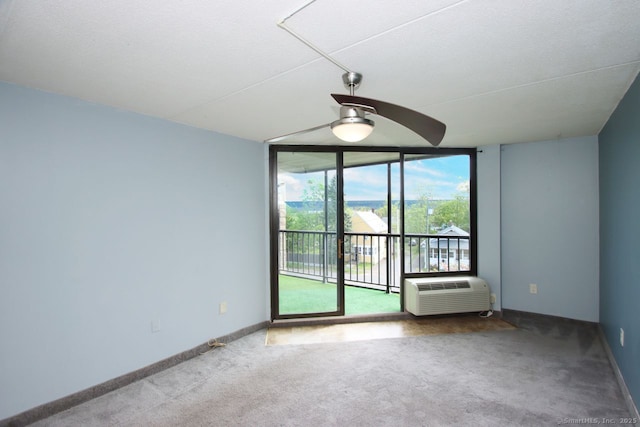 140 Captain Thomas Blvd Unit 307, West Haven, CT 06516 - carpeted spare room featuring a wall mounted air conditioner, baseboards, and floor to ceiling windows