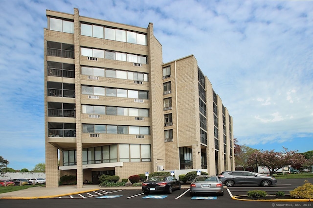 140 Captain Thomas Blvd Unit 307, West Haven, CT 06516 - view of apartment building / complex featuring uncovered parking
