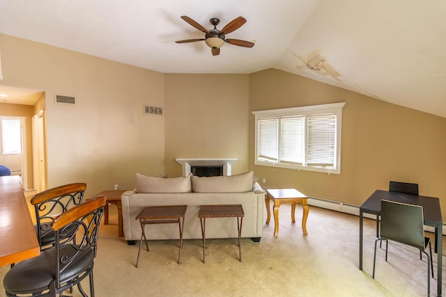 11 Byrne Ct Unit C2, Farmington, CT 06032 - living area with a ceiling fan, a baseboard heating unit, light colored carpet, and lofted ceiling