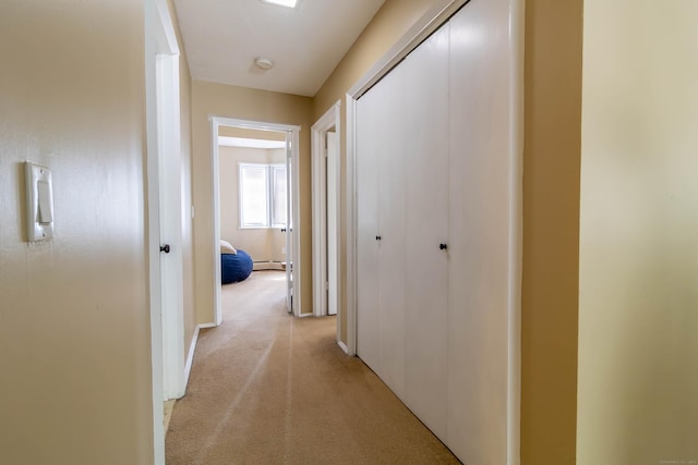 11 Byrne Ct Unit C2, Farmington, CT 06032 - hall with light colored carpet, a baseboard heating unit, and baseboards