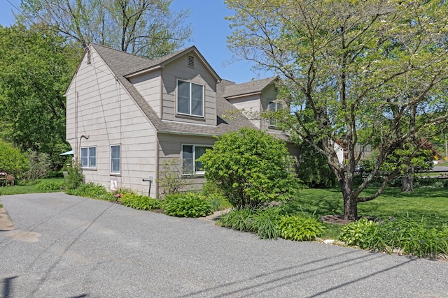 21 Bethpage Dr, Bethel, CT 06801 - view of home's exterior with roof with shingles