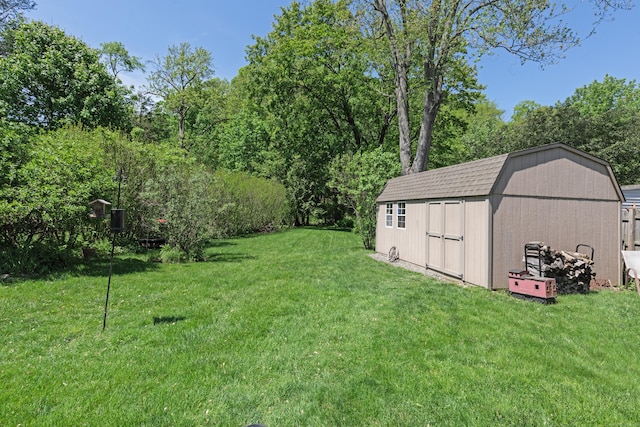21 Bethpage Dr, Bethel, CT 06801 - view of green lawn featuring a shed and an outbuilding