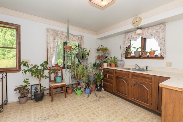 21 Bethpage Dr, Bethel, CT 06801 - kitchen featuring a sink, healthy amount of natural light, light countertops, and light flooring
