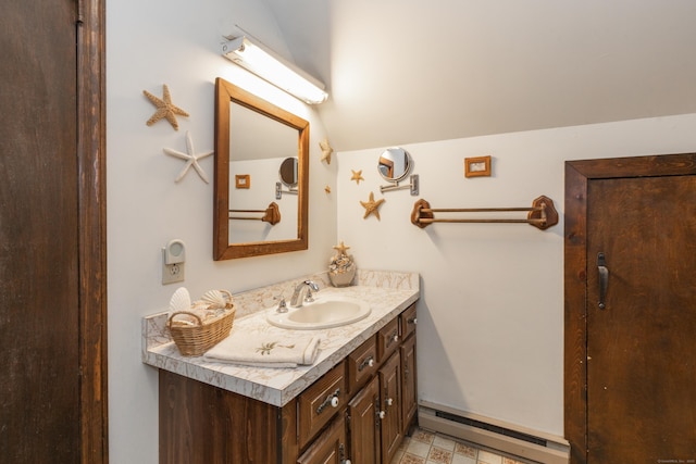 21 Bethpage Dr, Bethel, CT 06801 - bathroom with baseboard heating, vanity, and vaulted ceiling