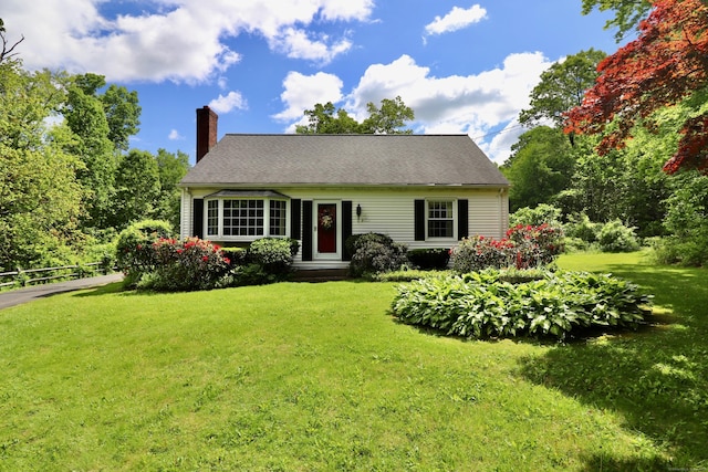 152 Cedar Ln, Middletown, CT 06457 - cape cod home featuring a chimney and a front lawn