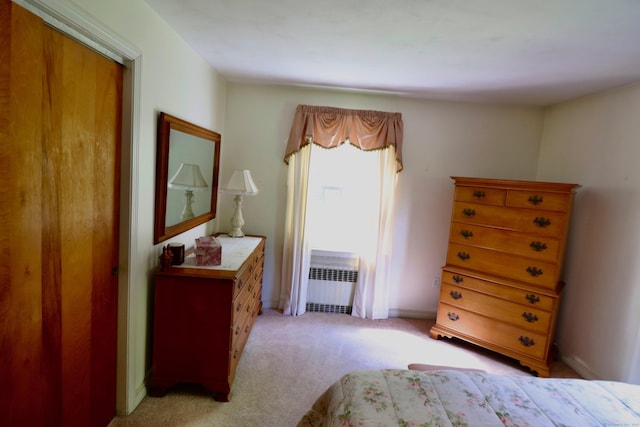 152 Cedar Ln, Middletown, CT 06457 - bedroom with radiator, light colored carpet, and baseboards