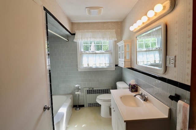 152 Cedar Ln, Middletown, CT 06457 - full bath with radiator heating unit, tile walls, toilet, vanity, and wallpapered walls