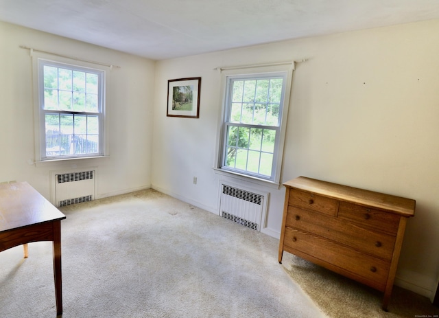 152 Cedar Ln, Middletown, CT 06457 - carpeted empty room featuring radiator heating unit, plenty of natural light, and baseboards
