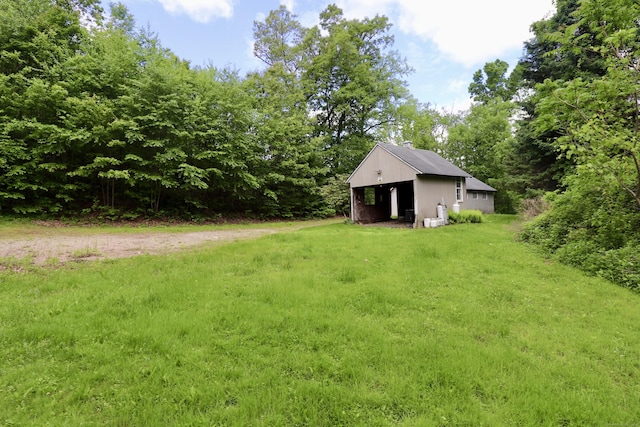 152 Cedar Ln, Middletown, CT 06457 - view of grassy yard with a pole building and an outbuilding
