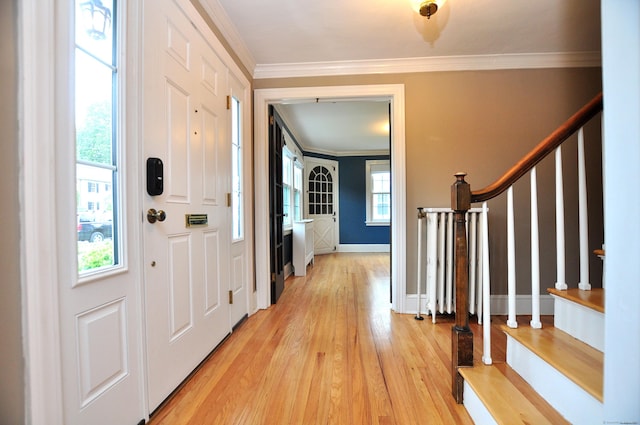 16 Ridgewood Rd, Windsor, CT 06095 - foyer with stairway, light wood finished floors, and crown molding