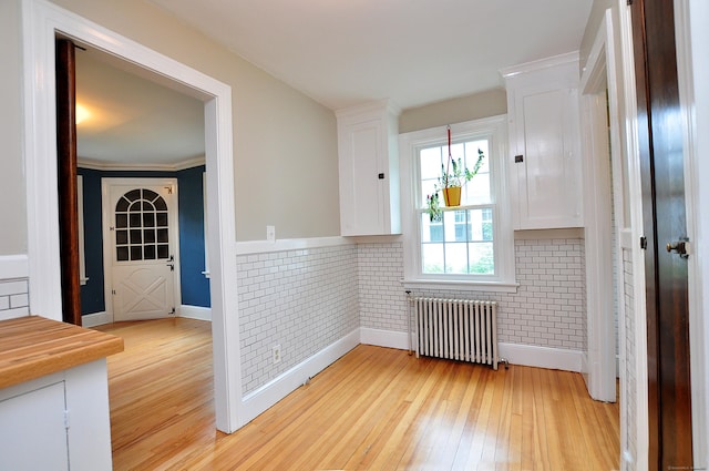 16 Ridgewood Rd, Windsor, CT 06095 - spare room featuring radiator heating unit and light wood-style flooring
