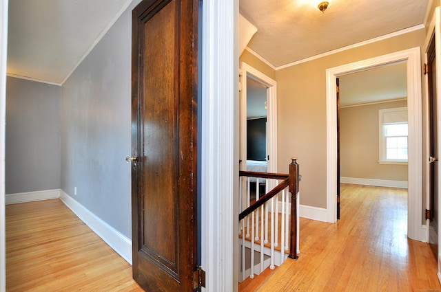 16 Ridgewood Rd, Windsor, CT 06095 - hall with an upstairs landing, ornamental molding, and light wood-style flooring