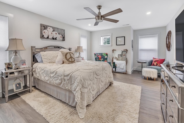 bedroom with recessed lighting, wood finished floors, and ceiling fan