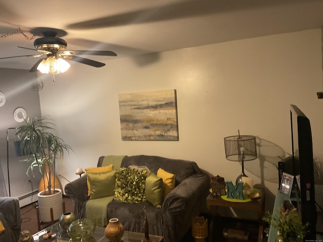 45 Ludlow St, Waterbury, CT 06710 - living area with a ceiling fan and a baseboard radiator