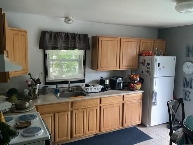 45 Ludlow St, Waterbury, CT 06710 - kitchen featuring white appliances, a sink, light countertops, and light tile patterned floors