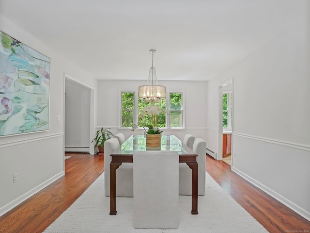 20 Mountain Wood Rd, Stamford, CT 06903 - dining room with wood finished floors, a chandelier, a baseboard heating unit, baseboards, and a baseboard radiator