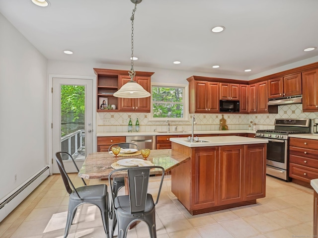 20 Mountain Wood Rd, Stamford, CT 06903 - kitchen with stainless steel appliances, baseboard heating, a sink, light countertops, and an island with sink