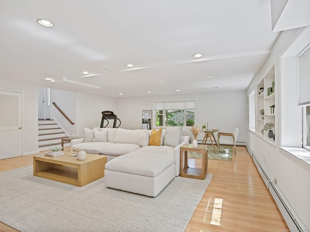 20 Mountain Wood Rd, Stamford, CT 06903 - living room featuring a baseboard radiator, light wood finished floors, recessed lighting, and stairway