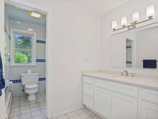 20 Mountain Wood Rd, Stamford, CT 06903 - full bath with baseboard heating, toilet, vanity, and baseboards