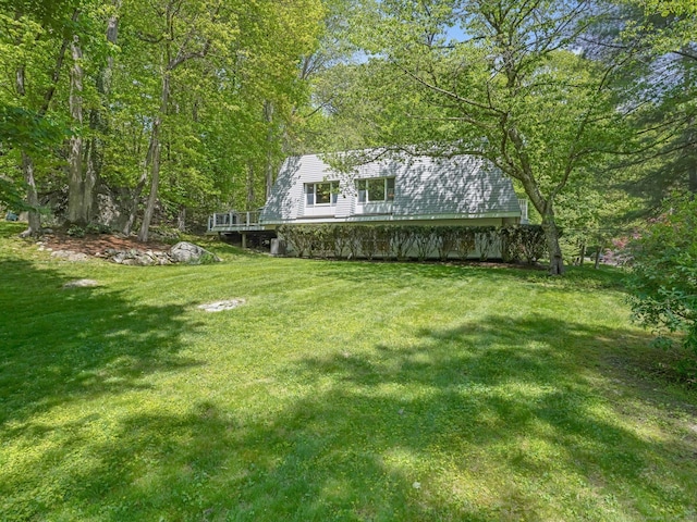 20 Mountain Wood Rd, Stamford, CT 06903 - view of grassy yard with a deck
