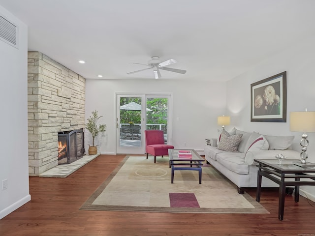 20 Mountain Wood Rd, Stamford, CT 06903 - living room with ceiling fan, wood finished floors, a stone fireplace, and baseboards